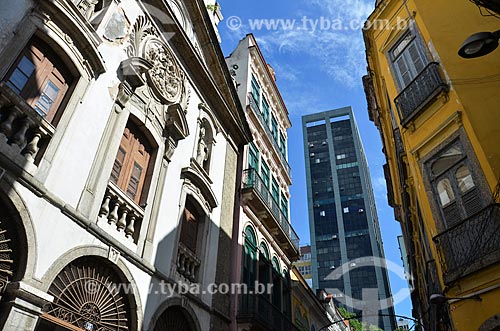  Facade of Matriz Church of Nossa Senhora da Lapa dos Mercadores (1766) with buildings in the background  - Rio de Janeiro city - Rio de Janeiro state (RJ) - Brazil