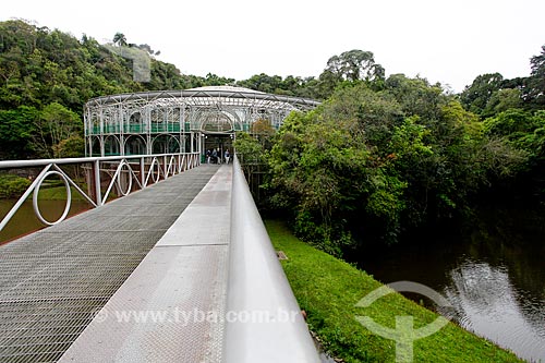  Footbridge with the Opera de Arame in the background - using pipes as structure and is perfectly integrated to the surrounding nature  - Curitiba city - Parana state (PR) - Brazil