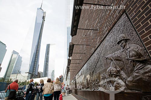 Panel honoring the dead firefighters - National September 11 Memorial and Museum (Ground Zero of the World Trade Center) with the WTC 1 in the background  - New York city - New York - United States of America