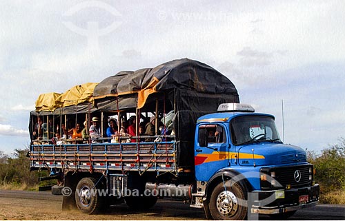  Pilgrims coming up pilgrimage of Bom Jesus da Lapa in truck body - also known as pau de arara  - Bom Jesus da Lapa city - Bahia state (BA) - Brazil