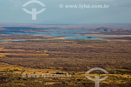 View of caatinga vegetation - backwood of Ceara with the Choro Dam - also known as Pompeu Sobrinho Dam - in the background  - Quixada city - Ceara state (CE) - Brazil