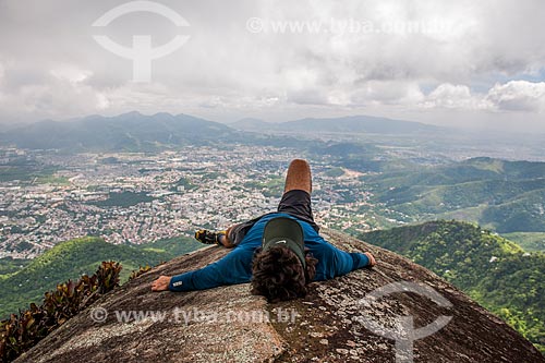  Man lying - Urubu Stone  - Rio de Janeiro city - Rio de Janeiro state (RJ) - Brazil