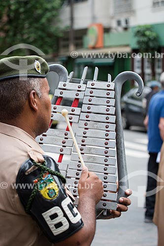 Band musician of the First Battalion of Guards of the Army Ministry with a glockenspiel shaped as Lira during the procession to Sao Jorge  - Rio de Janeiro city - Rio de Janeiro state (RJ) - Brazil