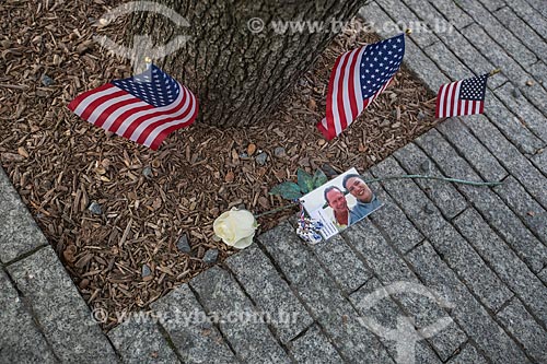 Detail of flower and photography - National September 11 Memorial and Museum (Ground Zero of the World Trade Center)  - New York city - New York - United States of America