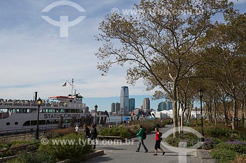  Hudson River waterfront - Battery Park with the Statue Cruises - boats that makes crossing to Statue of Liberty - to the lefth  - New York city - New York - United States of America