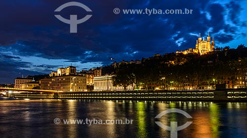  Saone River with Basilica of Notre-Dame de Fourviere illuminated in the background  - Lyon - Rhone Department - France