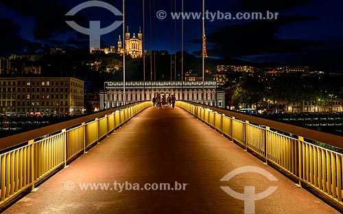  Bridge over Saone River with Basilica of Notre-Dame de Fourviere illuminated in the background  - Lyon - Rhone Department - France