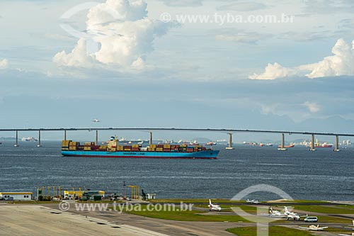  Track of Santos Dumont airport with cargo ship and Rio-Niteroi bridge in the background  - Rio de Janeiro city - Rio de Janeiro state (RJ) - Brazil