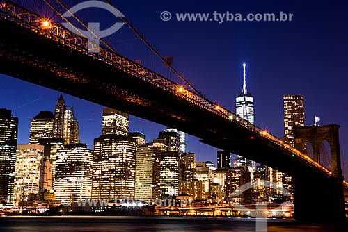  View of Brooklyn Bridge (1883) over of East River at nightfall  - New York city - New York - United States of America