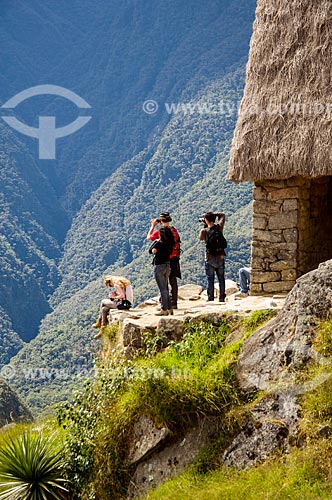  Tourists photographing - ruins of Machu Picchu  - Cusco Department - Peru
