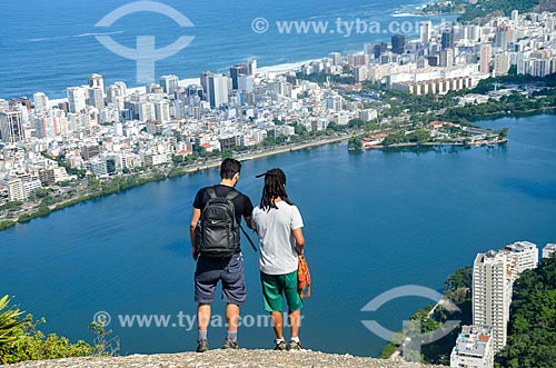  Men observing the Rodrigo de Freitas Lagoon from Cabritos Mountain (Kid Goat Mountain)  - Rio de Janeiro city - Rio de Janeiro state (RJ) - Brazil