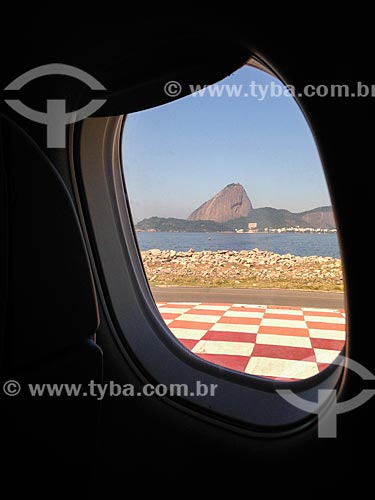  Airplane taxiing - Santos Dumont Airport with the  Sugar Loaf in the background  - Rio de Janeiro city - Rio de Janeiro state (RJ) - Brazil