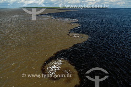  Top view of meeting of waters of Negro River and Solimoes River  - Manaus city - Amazonas state (AM) - Brazil