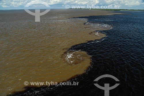  Top view of meeting of waters of Negro River and Solimoes River  - Manaus city - Amazonas state (AM) - Brazil