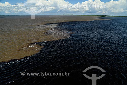  Top view of meeting of waters of Negro River and Solimoes River  - Manaus city - Amazonas state (AM) - Brazil