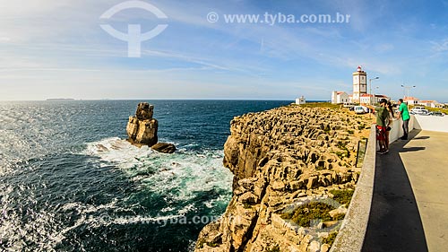  View of Cabo Carvoeiro (Cape Carvoeiro) with the rock formation known as Nau dos Corvos (Crows Carrack) - to the left - and the lighthouse - to the right  - Peniche municipality - Leiria district - Portugal