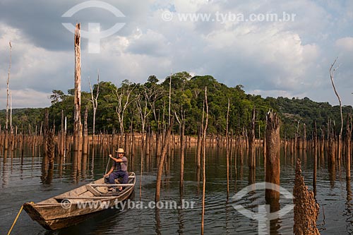  Riverine between the tree trunks that has submerged by the lake of Balbina Hydroelectric Plant  - Presidente Figueiredo city - Amazonas state (AM) - Brazil