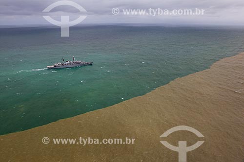  Aerial photo of the F Rademaker River Patrol Boat (P-49) with mud coming to sea by Doce River after dam rupture of the Samarco company mining rejects  - Linhares city - Espirito Santo state (ES) - Brazil