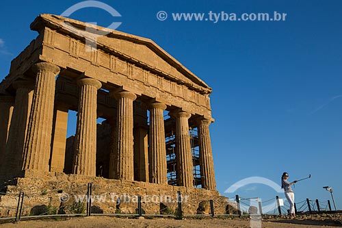  Tourist - Temple of Concordia - Valle dei Templi (Valley of the Temples) - ancient greek city Akragas  - Agrigento city - Agrigento province - Italy