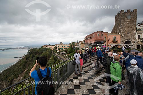  Tourists - Piazza 9 Aprile (April 9 Square) with the  Torre dell Orologio (Clock Tower) in the background  - Taormina city - Messina province - Italy