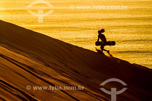  Silhouette - practitioner of sandboard - Cerro Dragon (Dune Dragon Hill)  - Iquique city - Iquique Province - Chile