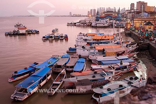  View of berthed boats - Acai Fair port with the Ver-o-peso Market (XVII century) in the background during the dawn  - Belem city - Para state (PA) - Brazil