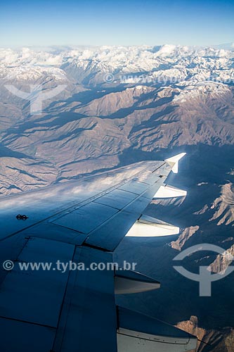  View of airplane wing and the Andes Mountain during flight over near to Santiago city  - Santiago city - Santiago Province - Chile