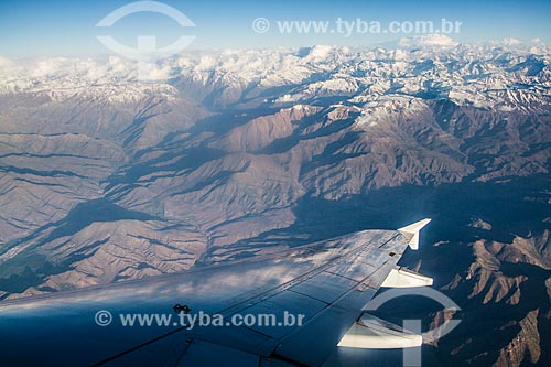  View of airplane wing and the Andes Mountain during flight over near to Santiago city  - Santiago city - Santiago Province - Chile