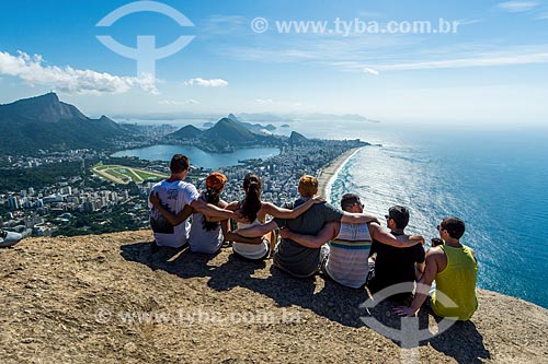  Persons in summit of the Morro Dois Irmaos (Two Brothers Mountain) with the Christ the Redeemer in the background  - Rio de Janeiro city - Rio de Janeiro state (RJ) - Brazil