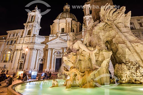  View of the Fontana dei Quattro Fiumi (Fountain of the Four Rivers) - 1651 - with the SantAgnese in Agone (Santa Ines Basilica) in the background  - Rome - Rome province - Italy