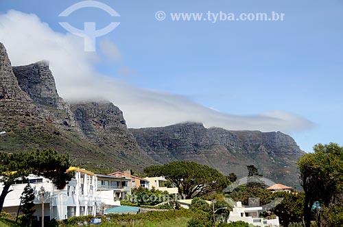  Houses - Camps Bay neighborhood with the Twelve Apostles - part of the Table Mountain - one of the New7Wonders of Nature - in the background  - Cape Town city - Western Cape province - South Africa
