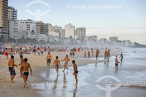  Men playing soccer on the banks of the Ipanema Beach  - Rio de Janeiro city - Rio de Janeiro state (RJ) - Brazil
