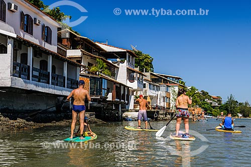  Practitioners of stand up paddle - Restinga Marambaia - the area protected by the Navy of Brazil  - Rio de Janeiro city - Rio de Janeiro state (RJ) - Brazil