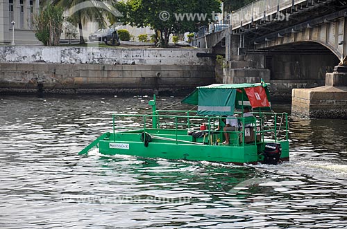  View of Ecoboat - boat with equipment that collects floating solid waste in the water - from the Mayor Luiz Paulo Conde Waterfront (2016)  - Rio de Janeiro city - Rio de Janeiro state (RJ) - Brazil