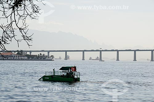  View of Ecoboat - boat with equipment that collects floating solid waste in the water - Guanabara Bay  - Rio de Janeiro city - Rio de Janeiro state (RJ) - Brazil