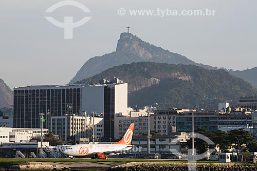  Airplane of GOL - Intelligent Airlines - Santos Dumont Airport (1936) with the Christ the Redeemer in the background  - Rio de Janeiro city - Rio de Janeiro state (RJ) - Brazil
