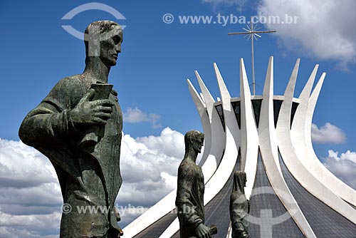  Sculpture The Four Evangelists and in the background Metropolitan Cathedral of Nossa Senhora Aparecida (1958) - also known as Cathedral of Brasilia  - Brasilia city - Distrito Federal (Federal District) (DF) - Brazil
