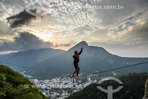  Practitioner of slackline - Cabritos Mountain (Kid Goat Mountain) - with the Christ the Redeemer in the background  - Rio de Janeiro city - Rio de Janeiro state (RJ) - Brazil