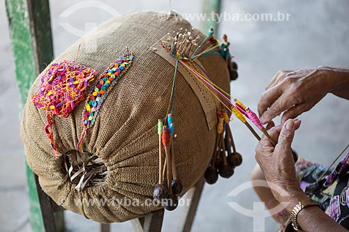  Detail of woman weaving - bobbin lace  - Raposa city - Maranhao state (MA) - Brazil
