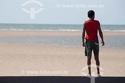  Man observing the landscape - Carima Beach  - Raposa city - Maranhao state (MA) - Brazil