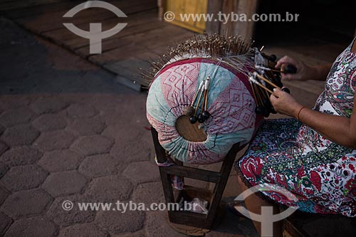  Detail of woman weaving - bobbin lace  - Raposa city - Maranhao state (MA) - Brazil