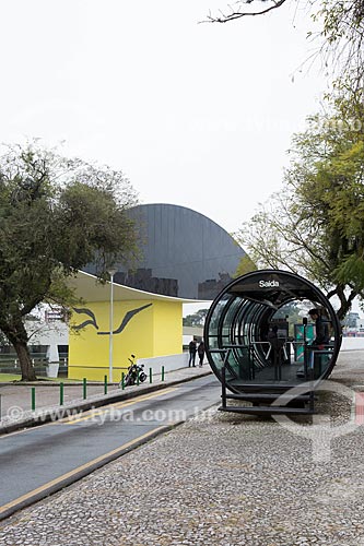  Tubular station of articulated buses - also known as the Tube Station - with the Oscar Niemeyer Museum in the background  - Curitiba city - Parana state (PR) - Brazil