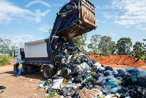  household waste collection truck pouring into garbage separation plant  - Garca city - Sao Paulo state (SP) - Brazil
