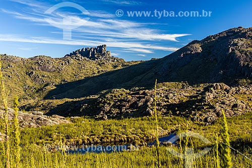  Landscape during trail between Agulhas Negras Peak to Hermes Wing Mountain - Itatiaia National Park with the Prateleiras Massif in the background  - Itatiaia city - Rio de Janeiro state (RJ) - Brazil