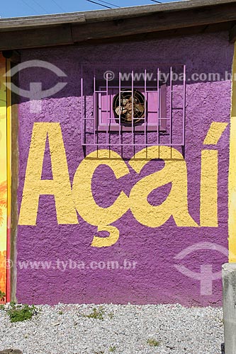  Detail of kiosk wall that says: Acai - Campeche Beach  - Florianopolis city - Santa Catarina state (SC) - Brazil