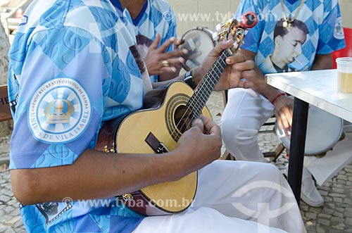  Man playing small guitar - Roda de samba of Musicians of Gremio Recreativo Escola de Samba Unidos de Vila Isabel  - Rio de Janeiro city - Rio de Janeiro state (RJ) - Brazil