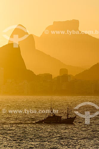 View of fishing boat - Guanabara Bay from Cotunduba Island with Morro Dois Irmaos (Two Brothers Mountain) and the Rock of Gavea in the background  - Rio de Janeiro city - Rio de Janeiro state (RJ) - Brazil