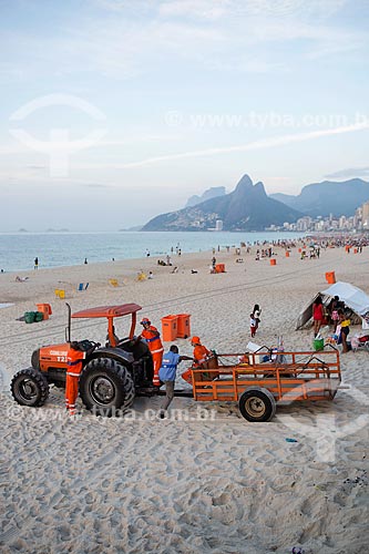  Refuse collectors cleaning the Ipanema Beach - post 8 - with tractor after the Reveillon party  - Rio de Janeiro city - Rio de Janeiro state (RJ) - Brazil