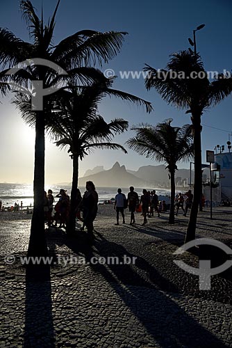  Sunset - Arpoador Beach waterfront with the Morro Dois Irmaos (Two Brothers Mountain) and the Rock of Gavea in the background  - Rio de Janeiro city - Rio de Janeiro state (RJ) - Brazil