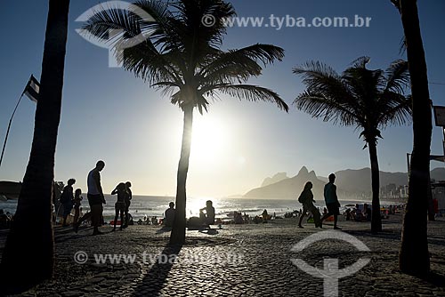  Sunset - Arpoador Beach waterfront with the Morro Dois Irmaos (Two Brothers Mountain) and the Rock of Gavea in the background  - Rio de Janeiro city - Rio de Janeiro state (RJ) - Brazil